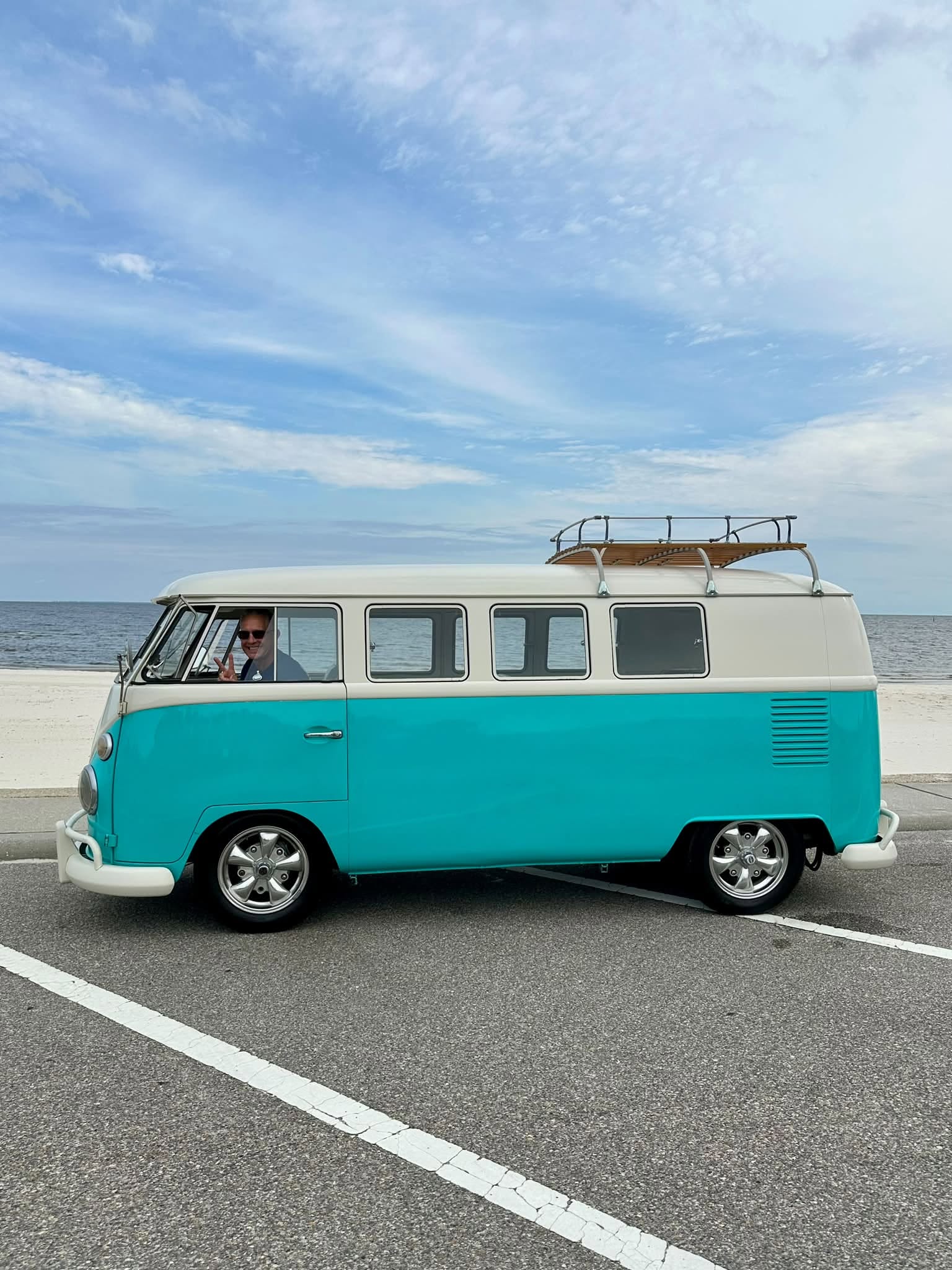 Turquoise and white vintage Volkswagen bus photographed for Tacot Garage