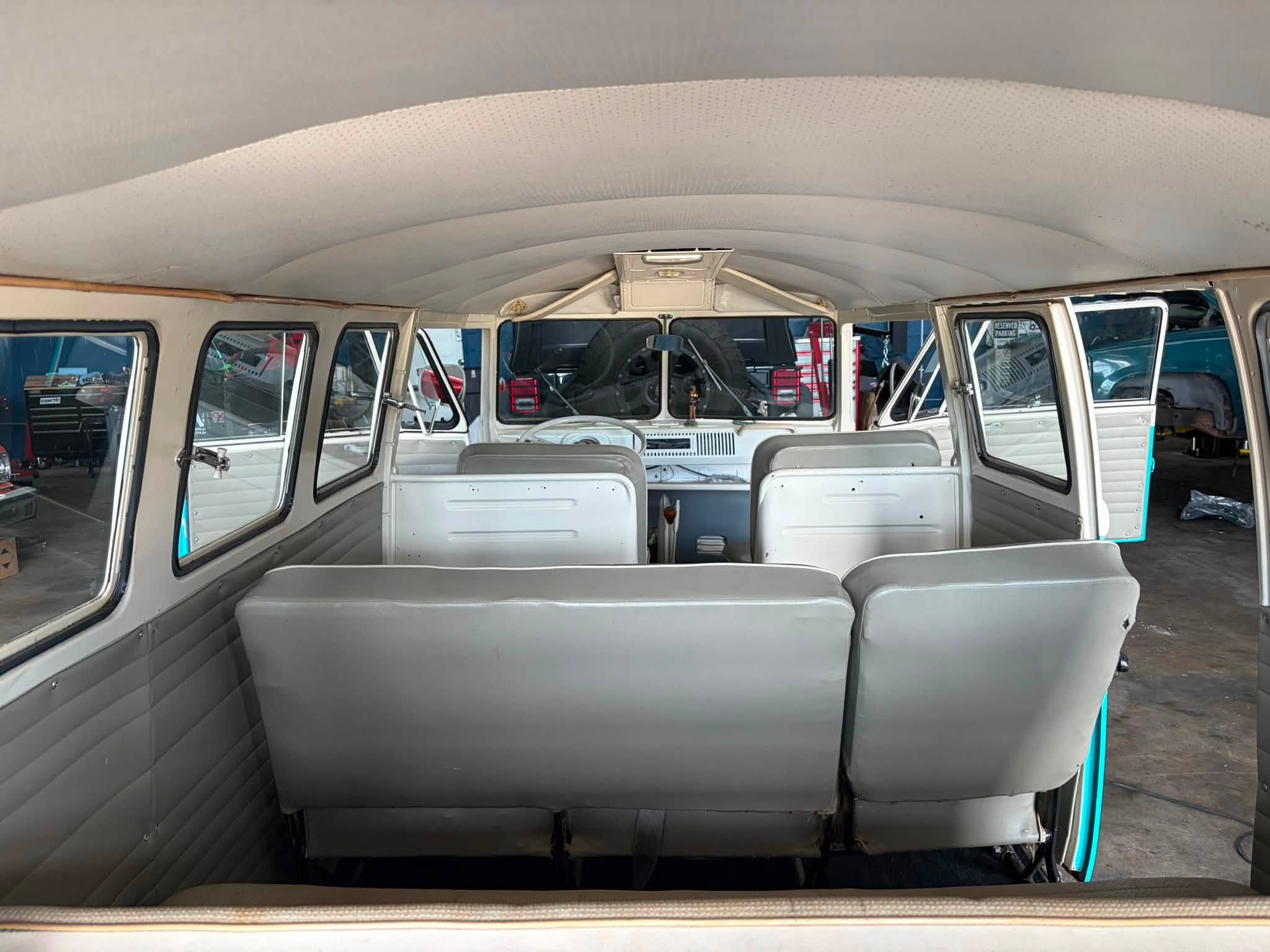 Restored passenger seating inside a vintage Volkswagen bus